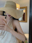Tiitaa.com × Tiitaa: Large Brim Straw Hat runway look in Beige